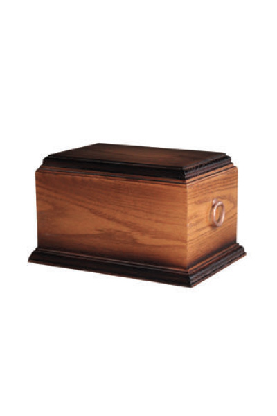 Solid Oak Casket Urn with bronze ring.
